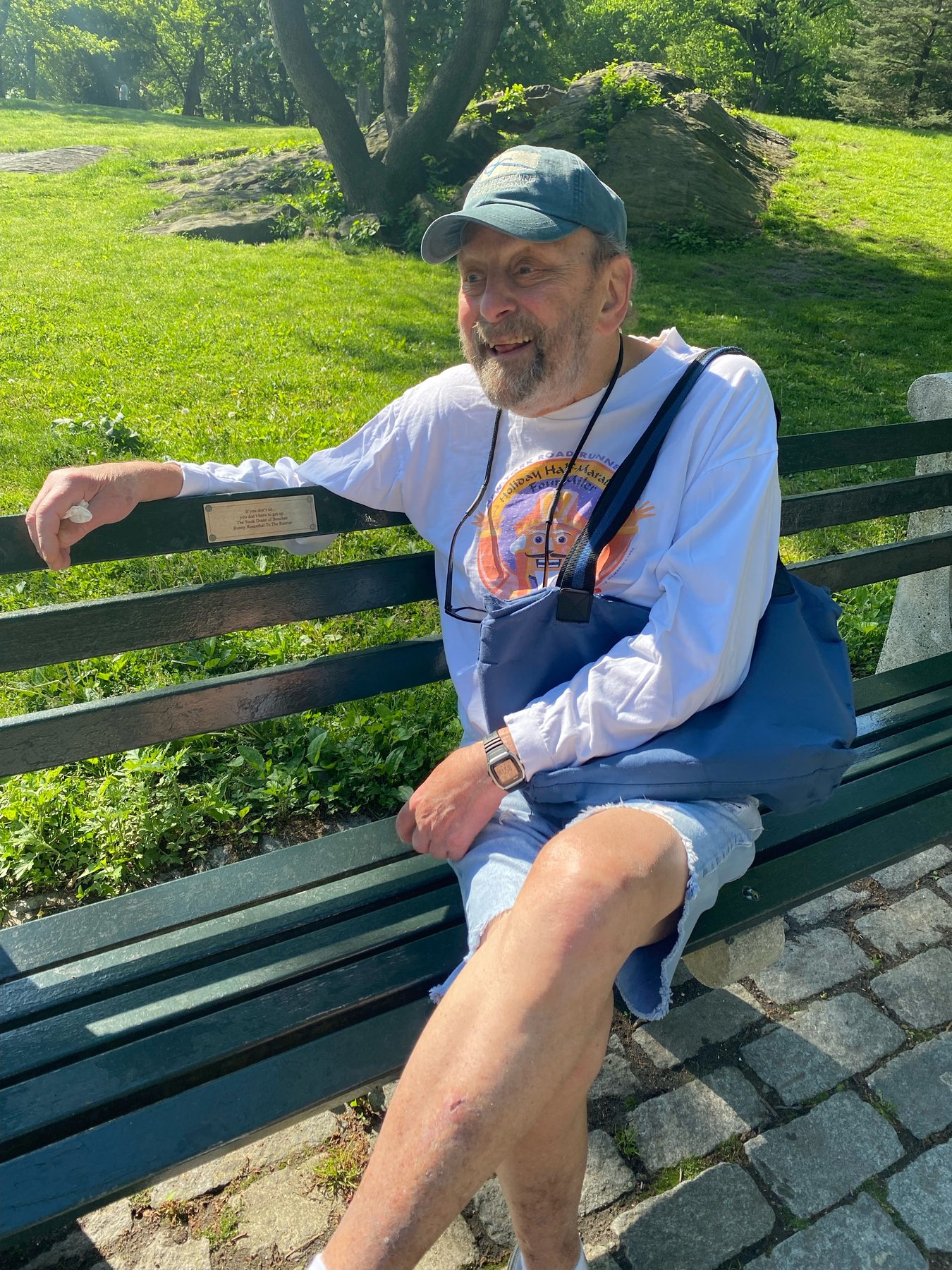 A guest enjoying a sunny afternoon on Bunny's bench